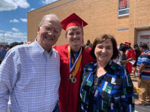 Linda, her husband, Bill, and their Grandson, Hagen.