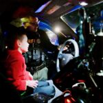A police officer lets KKids explore the cruiser in Barren River.